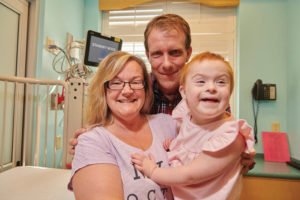 Dr. Chris Hugge with patient Lily LaMartina and mother, Anne