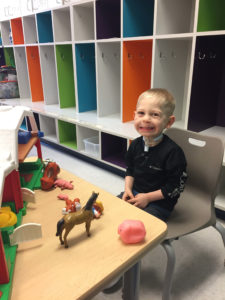 Cardinal Glennon patient Barrett playing with toys