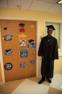 Cardinal Glennon kid Shaun Patterson outside his decorated hospital room