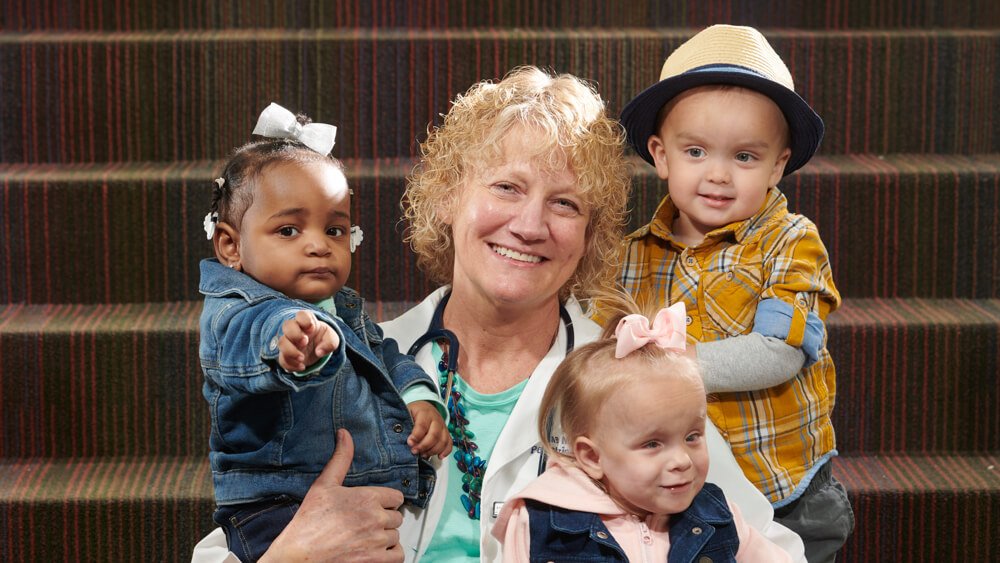 Dr. Ann Beck with Cardinal Glennon patients