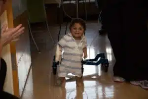 Cardinal Glennon kid Amjad walking