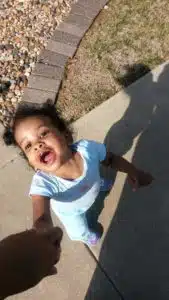 Cardinal Glennon kid Faith walking outside