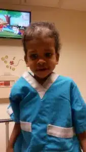 Cardinal Glennon kid Faith prepping for a procedure