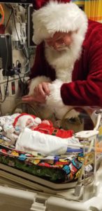 Cardinal Glennon patient Liam visited by Santa Clause at Cardinal Glennon
