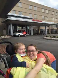 Liam and mother, Jessica outside Cardinal Glennon main entrance