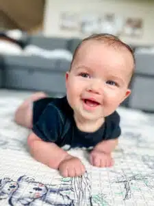 Chase - tummy time photo at home on a mat