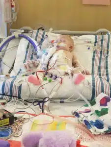 Kenzie - recovering in PICU bed