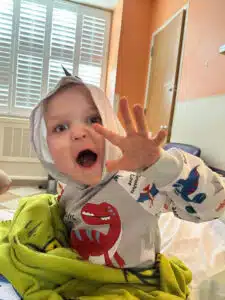 Easton - saying "Roar" for camera on hospital floor