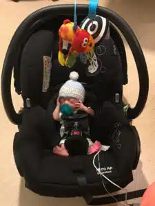 Colten - first day at home, tiny in his car seat