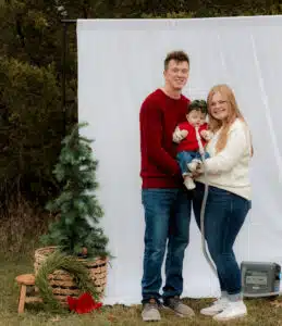 Josie with parents - Christmas photo