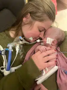 Josie with mom touching foreheads