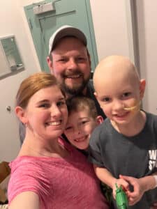 Wyatt and his family posing for a selfie photo
