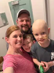 Wyatt and his family posing for a selfie photo