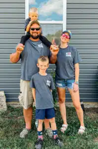 Wyatt's family posing while wearing "Wyatt Strong" t-shirts