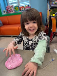 Cardinal Glennon patient Bristol playing with dough in the 4North playroom