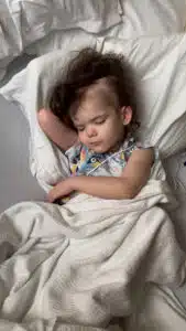 Cardinal Glennon patient Bristol sleeping in her hospital bed