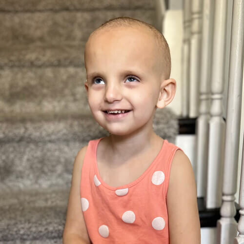 Juliana sitting on stairs