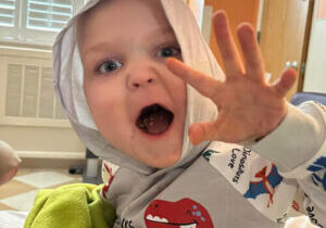 Easton - saying "Roar" to camera on hospital floor