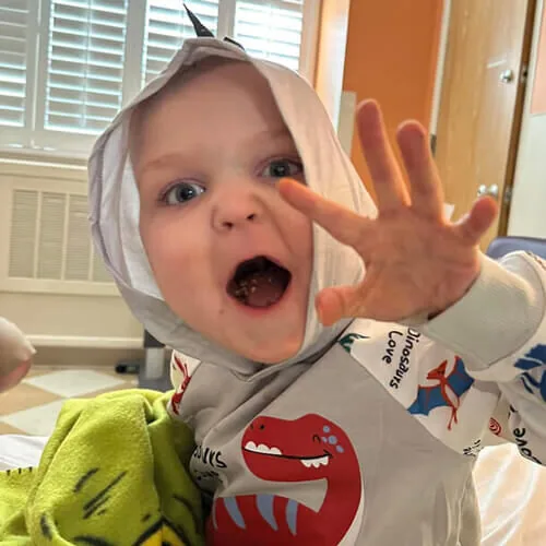 Easton - saying "Roar" to camera on hospital floor