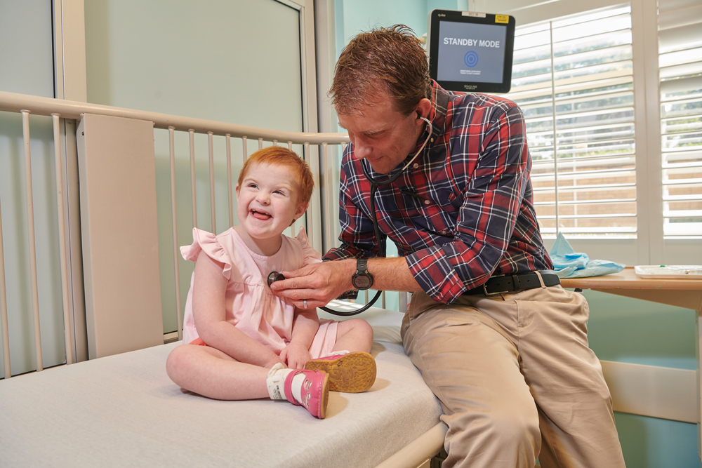 Lilly-014 Cardinal Glennon kid Lilly LaMartina with Dr. Chris Hugge